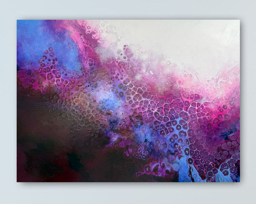 Abstract art piece with swirling patterns of blue, pink, and purple on a white background