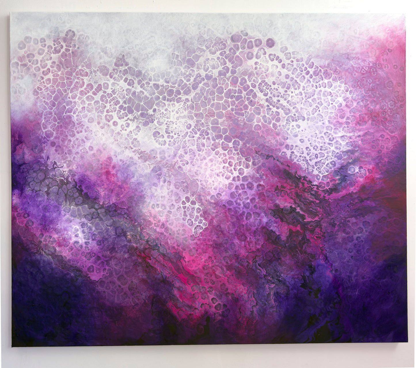 Abstract art piece with pink purple and white patterns on a light gray background