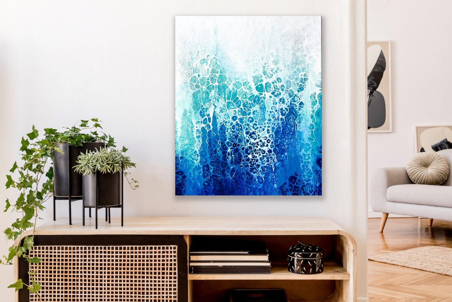 abstract ocean art blue fluid painting hanging in modern interior home decor wall art