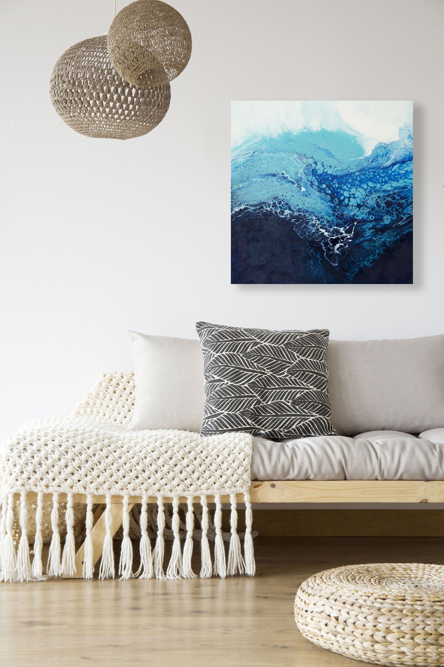 abstract ocean art blue fluid painting hanging in modern interior