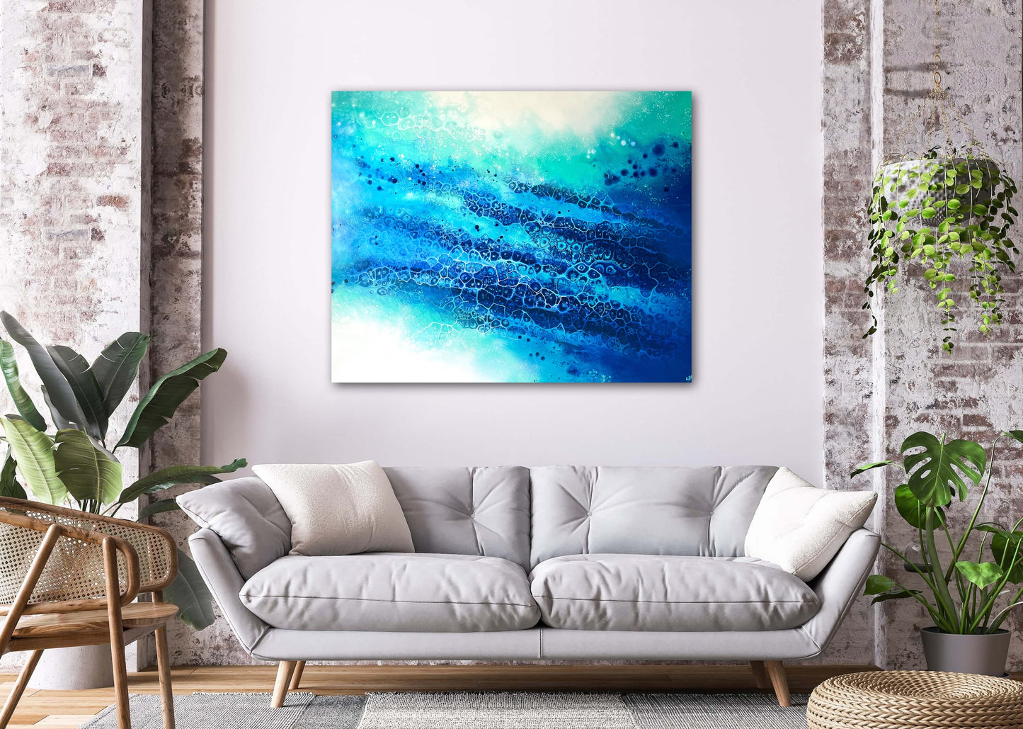 abstract ocean art blue fluid painting hanging in modern interior 