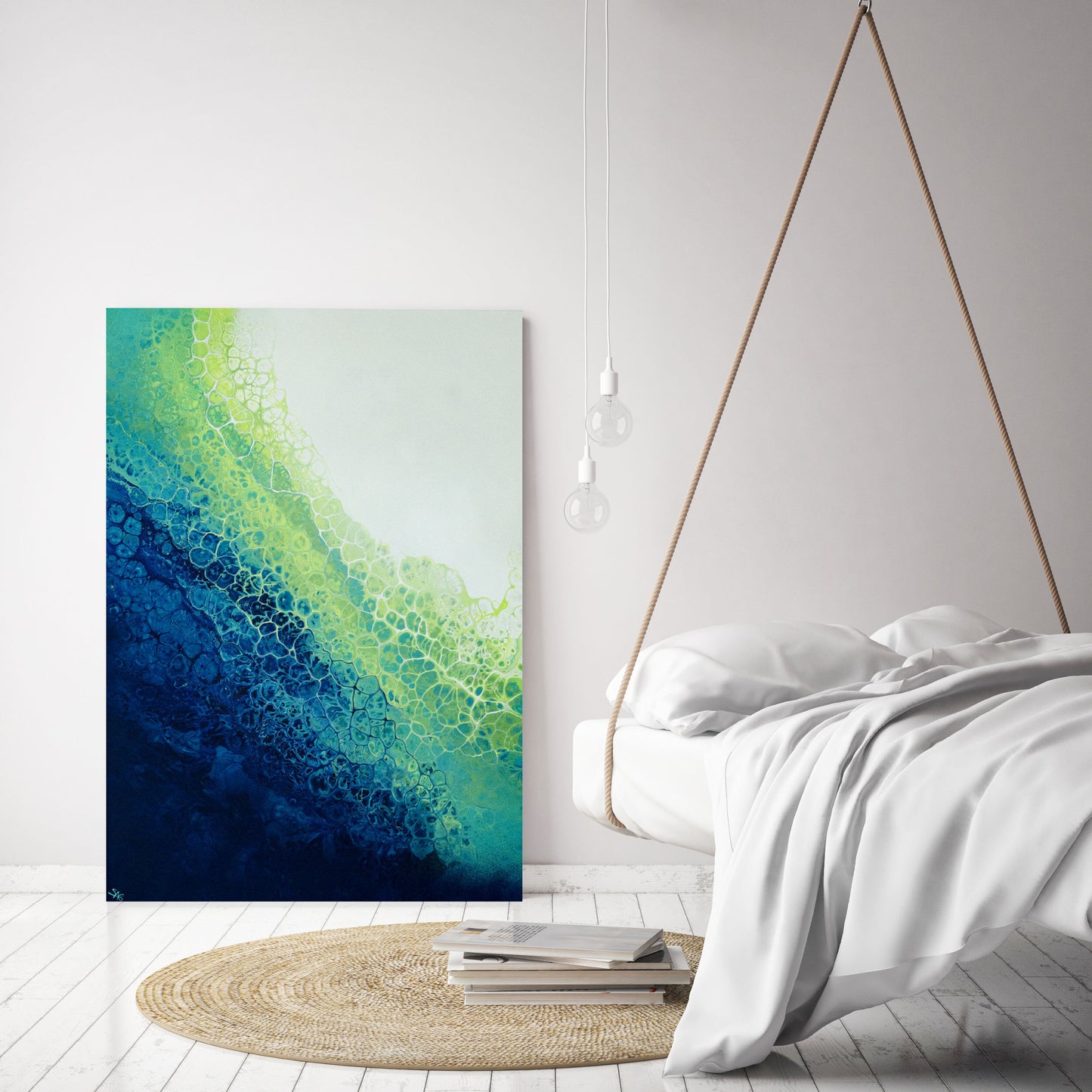 abstract ocean art yellow and blue fluid painting hanging in modern interior 
