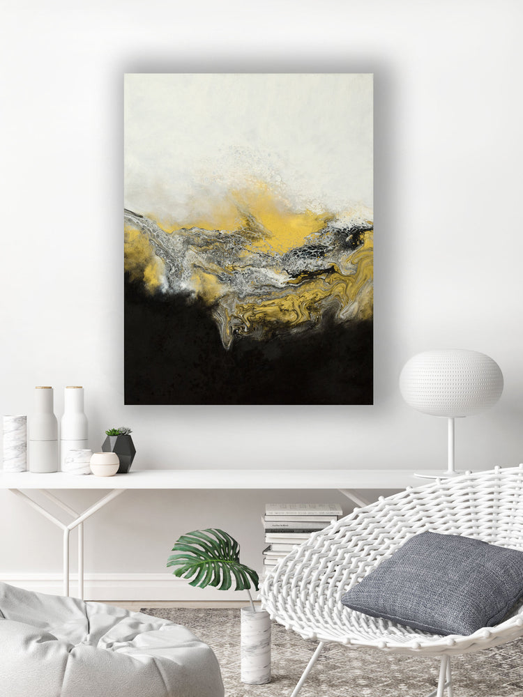 abstract gold and black fluid painting hanging in modern interior 